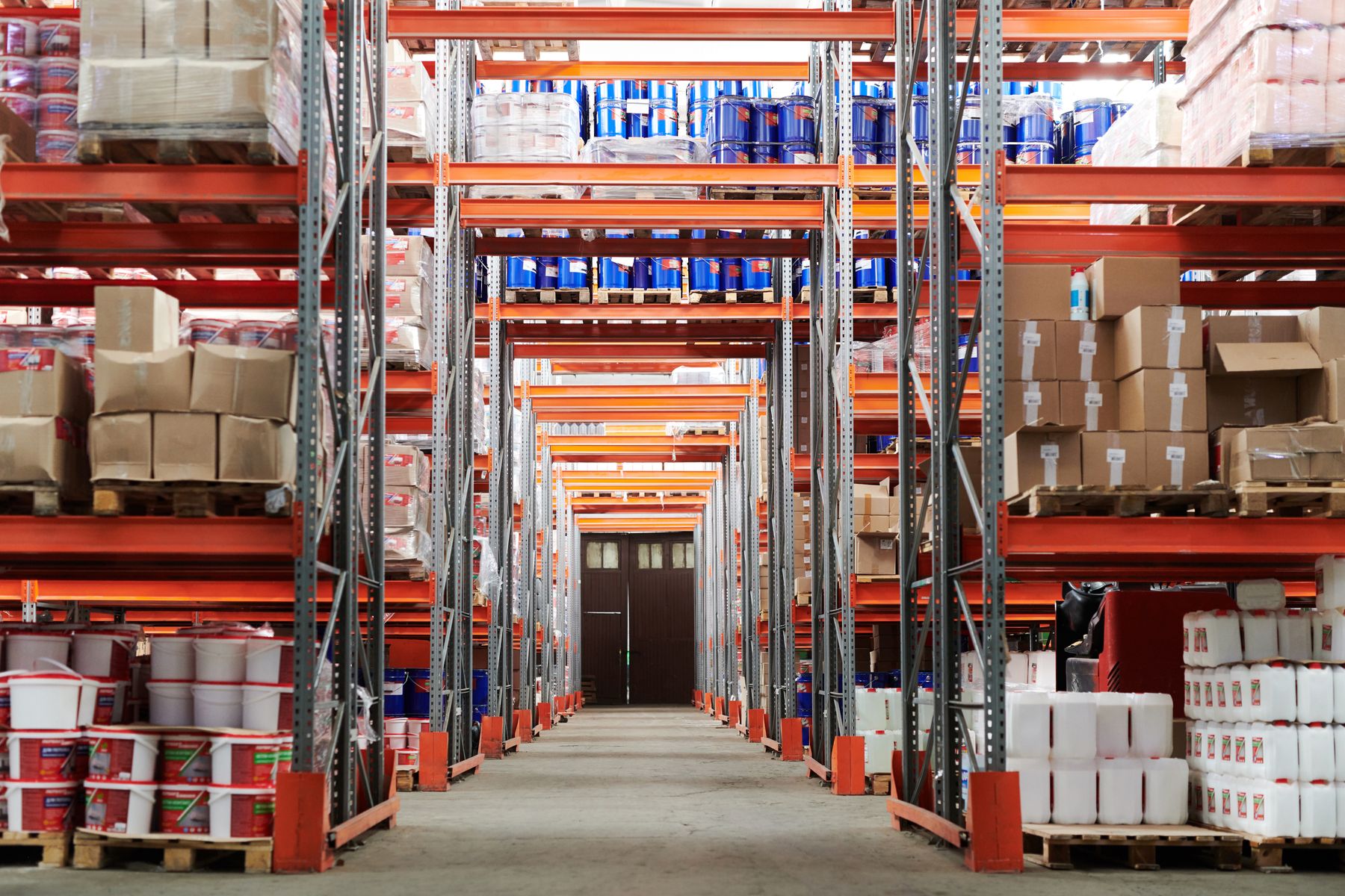 Organized industrial storage aisle representing cold-storage and equipment logistics